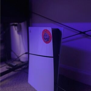 2 Ps5 gaming systems, 1 Digital slim and 1 is the Disc version